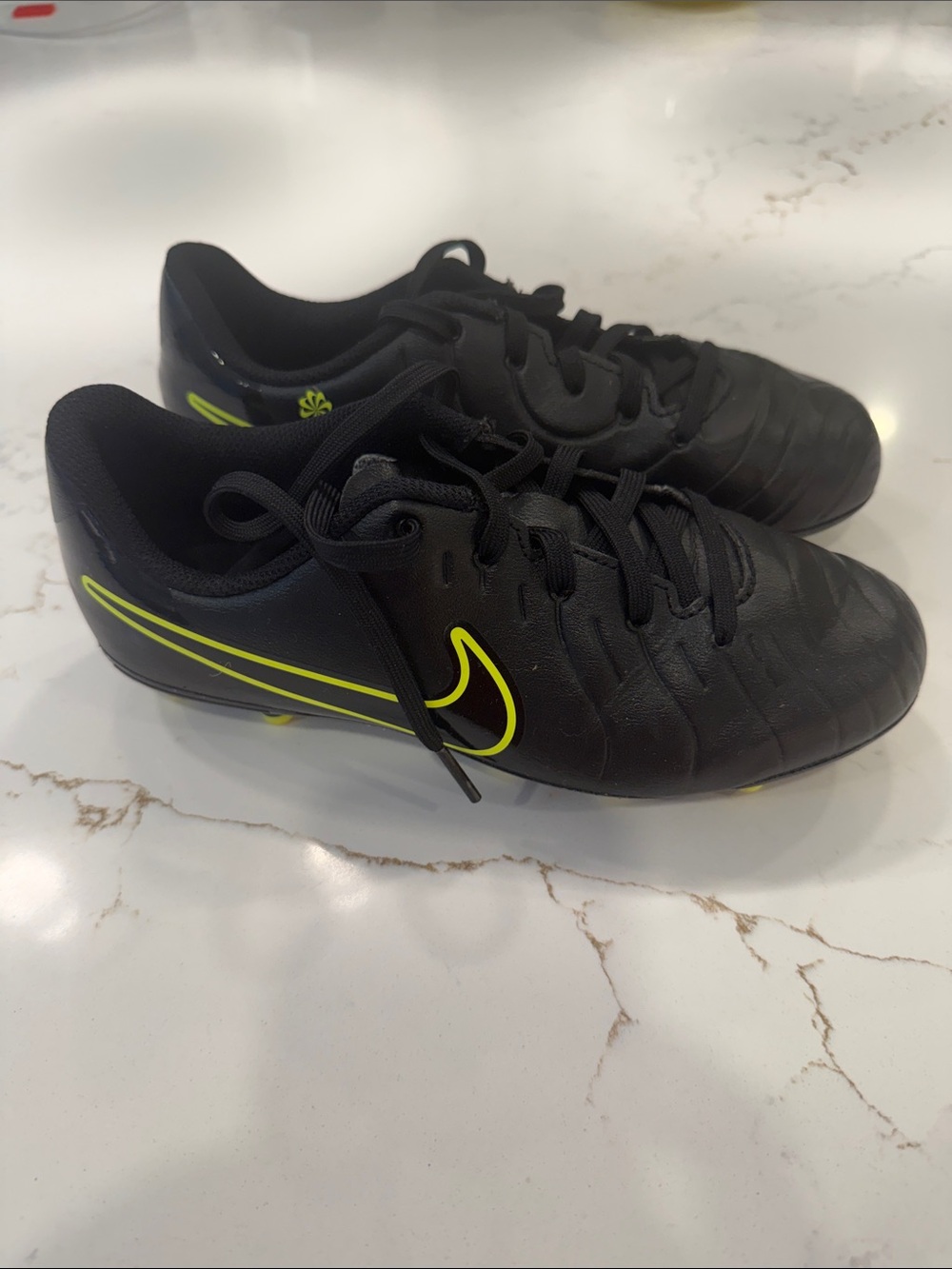 Nike Black Soccer Cleats with Neon Yellow Accents
